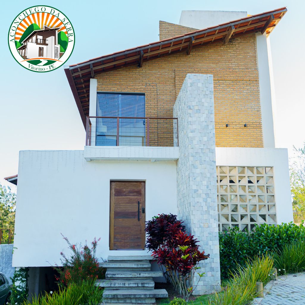 aconchego da serra fachada + logo